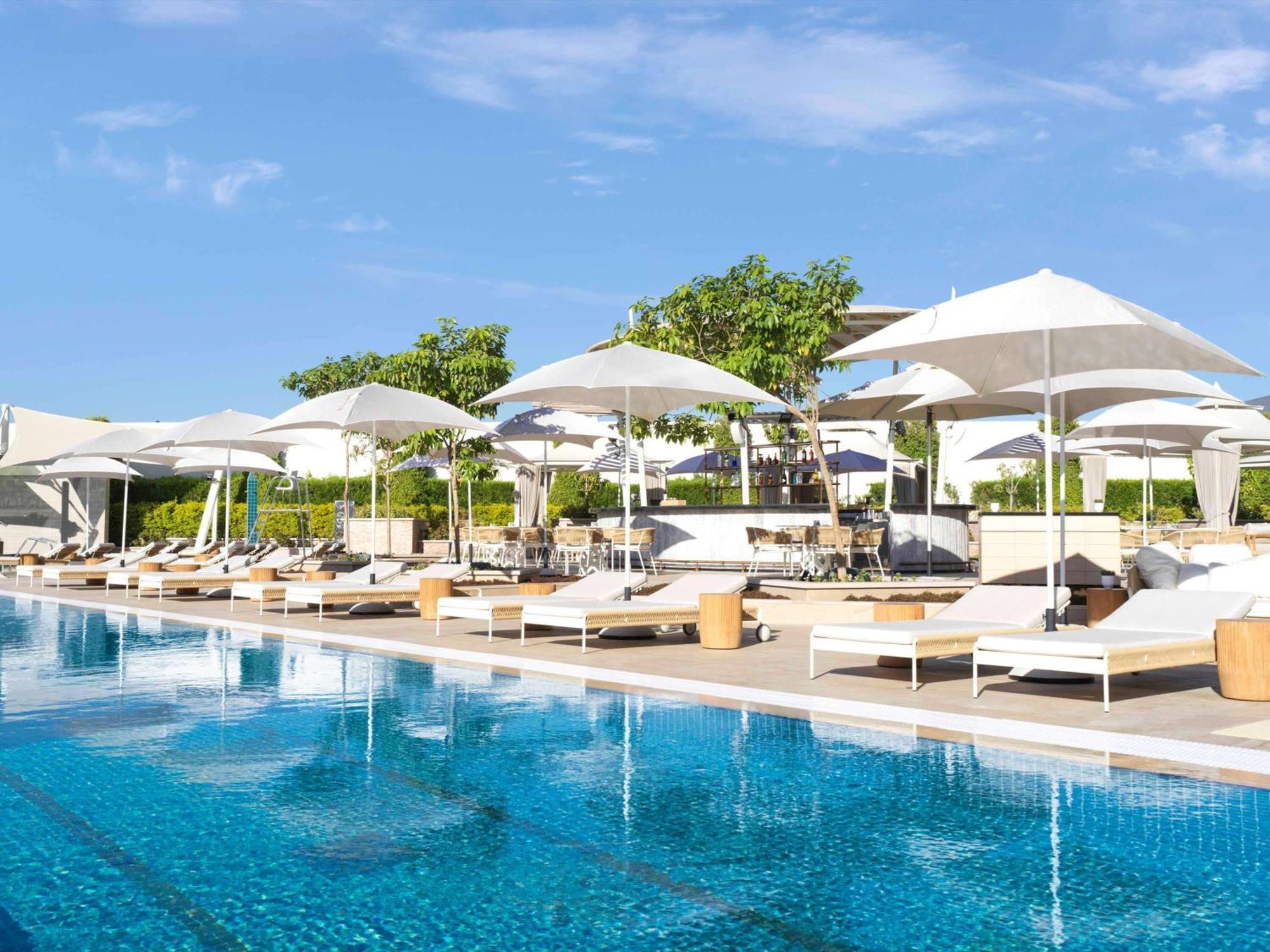 Sofitel Dubai The Obelisk Ξενοδοχείο Εξωτερικό φωτογραφία The pool at the hotel